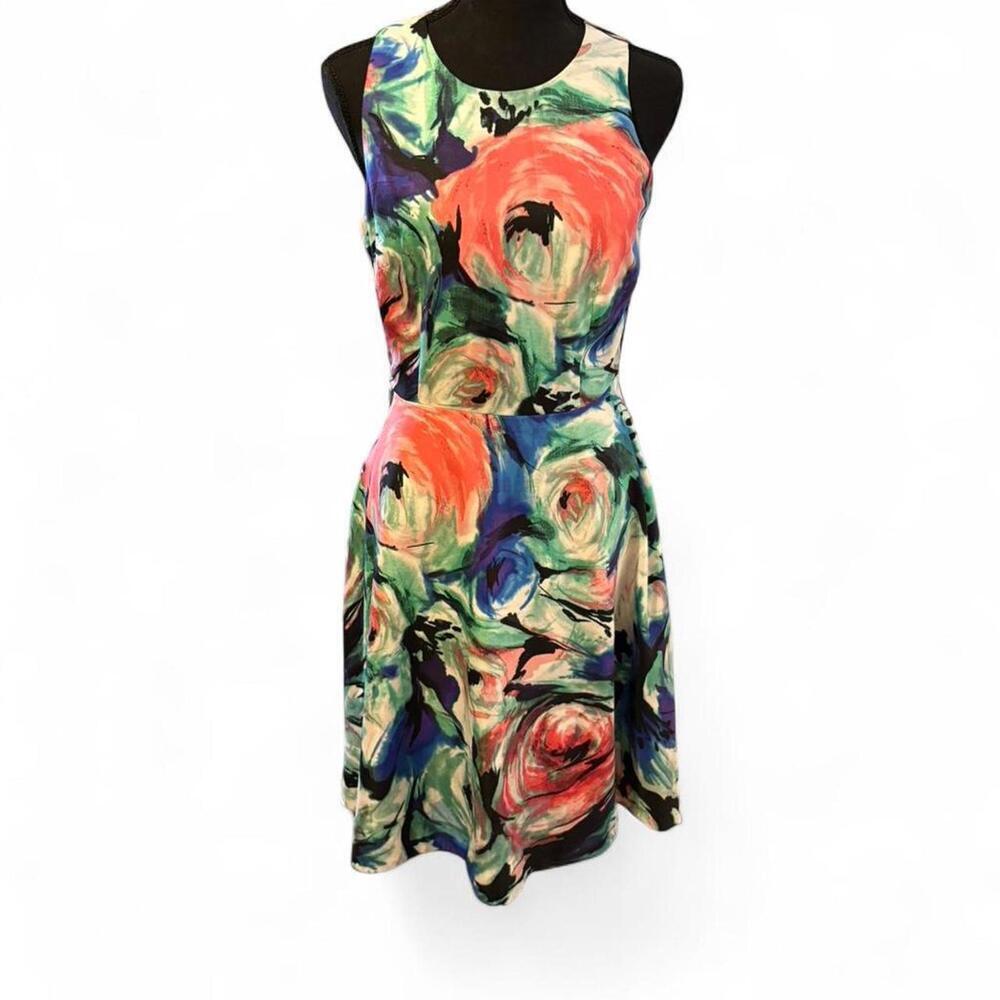 Donna Morgan watercolor floral print  with pockets Size 4